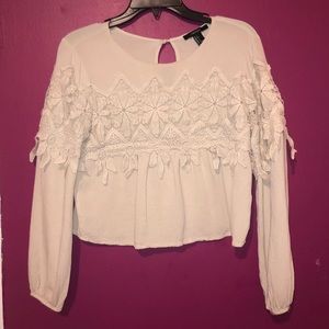 Small blouse shirt with floral detail